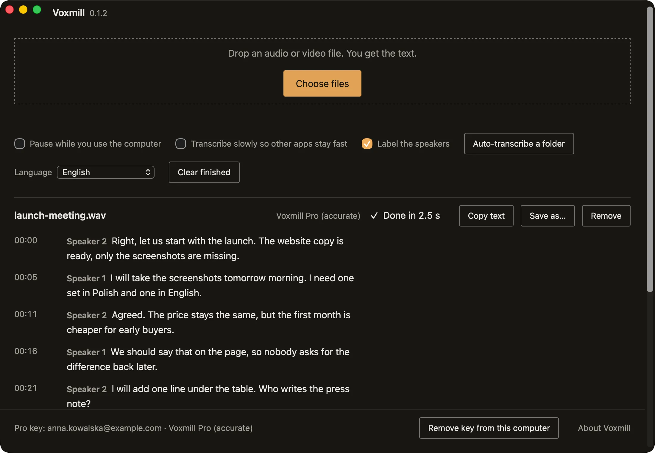 The Voxmill 0.1.2 window with a finished transcript of launch-meeting.wav: timestamped lines from two speakers, the Voxmill Pro model, Copy text and Save as buttons.